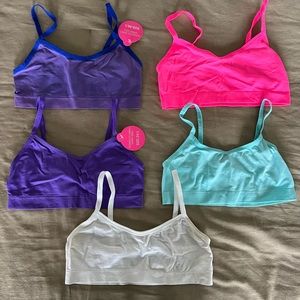 Various seamless girls sports bras.  2 new w/ tags. 3 barely worn.